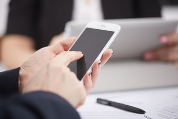 mobile phone in the women's hands