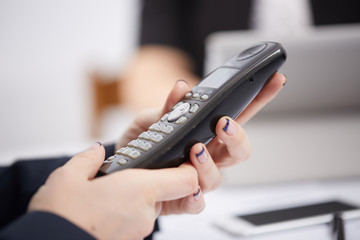 Radio phone in female hands