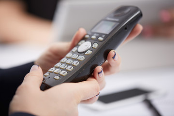 Radio phone in female hands