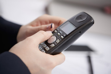Radio phone in female hands