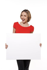 Young woman holding a whiteboard - isolated