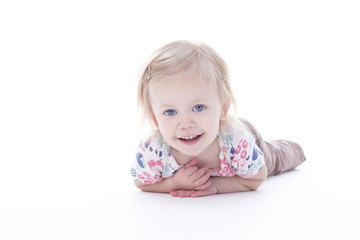 Fototapeta premium toddler girl laying down