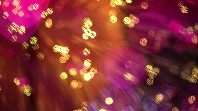 Multicolored lights with bokeh, defocused motion abstract background 