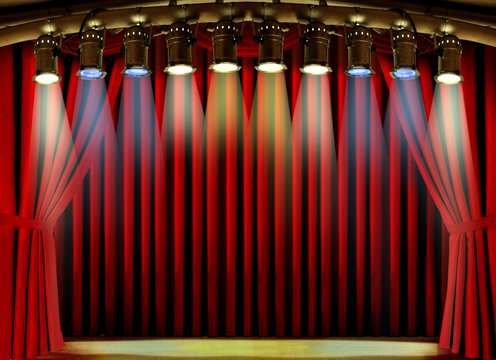 Empty stage with red curtain and spot lights