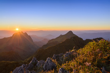 Obraz premium twilight between the sun set at the peak of Chiang Dao mountain,Chiang Mai,Thailand with the beauty alpine scene