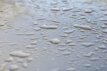 Group of dew on car roof in morning