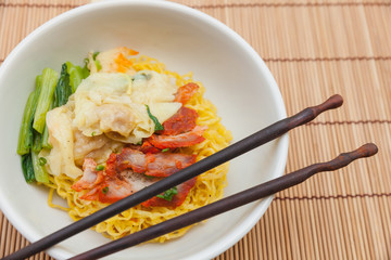 Noodles with dumpling and vegetables.
