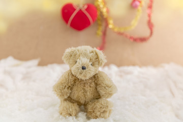 teddy bear sitting on snow