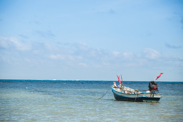 Naklejka na ściany i meble Fisherman boat with blue sky in koh phangan, Surat Thani, Thaila