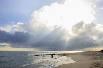 Landscape of sea, beach and  cloudy sky which has sun beam  ; southern of Thailand