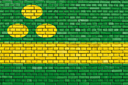 flag of Vilaur painted on brick wall