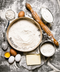 Preparation of the dough. Ingredients for the dough - Sieve flour, sour cream, butter, eggs with a rolling pin.