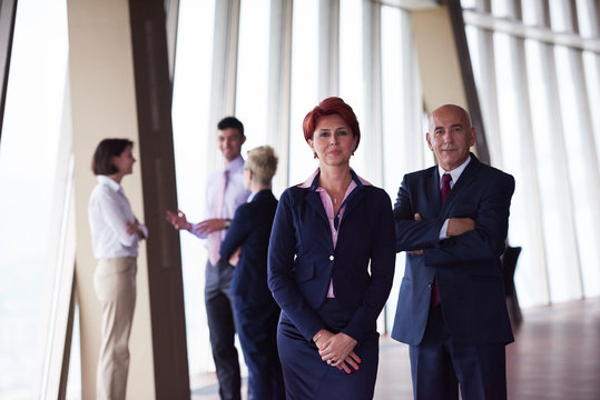 diverse business people group with redhair  woman in front