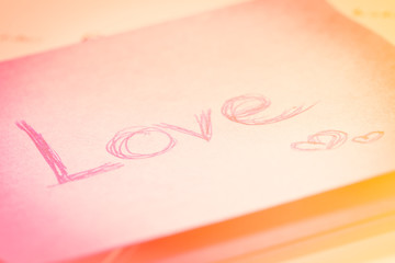 word love on paper note