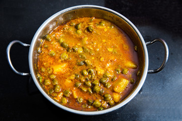 indian dish green gram with toamto curry and potatoes