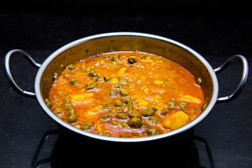 indian dish green gram with toamto curry and potatoes
