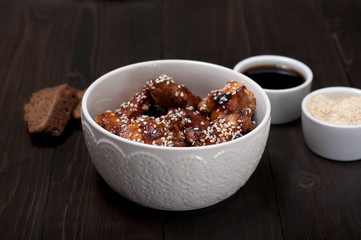 chicken wings in soy sauce with honey and sesame