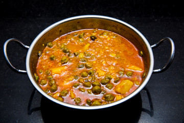 indian dish green gram with toamto curry and potatoes