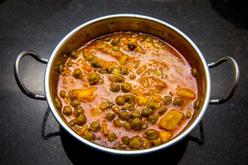 indian dish green gram with toamto curry and potatoes