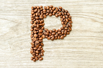 Coffee Letter P On Wood.