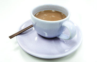 cocoa drink in cup on white
