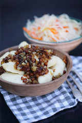 Ukrainian vareniki with bacon and coleslaw
