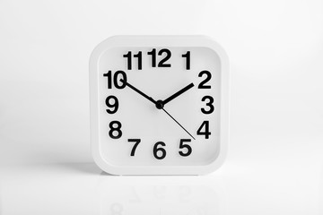 Office clock, isolated on white.