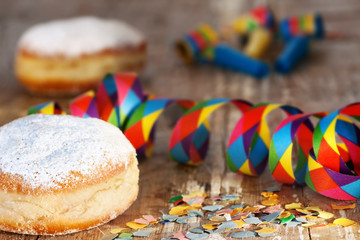 Fototapeta na wymiar Delicious donuts for Mardi Gras