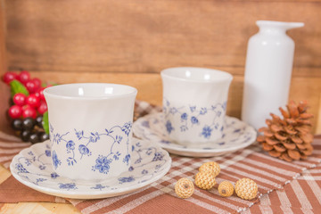 Vintage Filter : Tea Cup Set on wood background