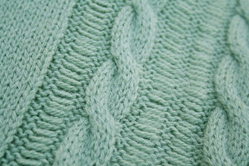 dettaglio di maglione di lana verde