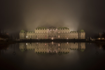 Belvedere palace in Vienna at a foggy night