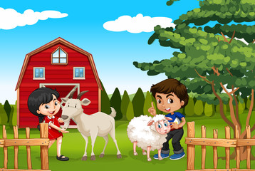 Boy and girl with farm animals in the farm