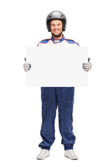 Young male car racer holding a blank banner © Ljupco Smokovski