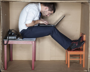 businessman in a strange position 