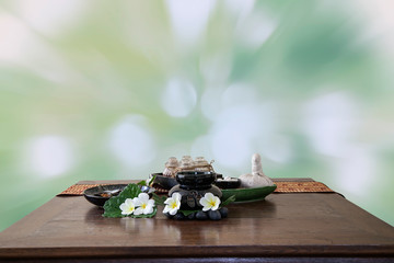 Thai spa massage setting  herbal compress balls, essential oil b