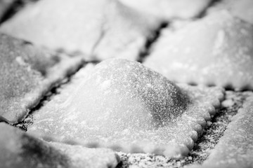 Pelmeni - Russian ravioli. Cooking process. Selective focus. Ton