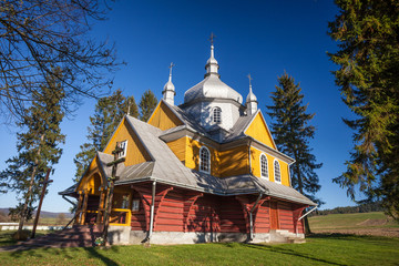 Fototapeta na wymiar Wooden church in Gladyszow, Poland