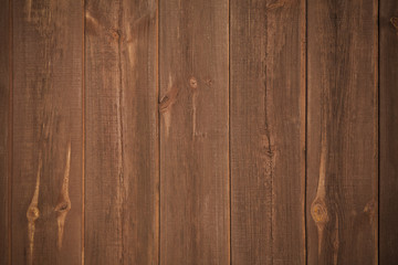 Naklejka premium brown wooden background