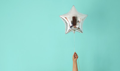 star balloon of success on colorful background