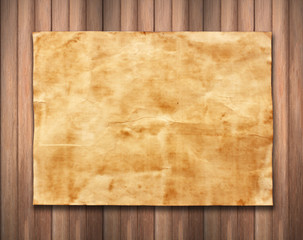 old paper on wood background texture.