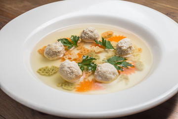 Soup with meatballs and noodles