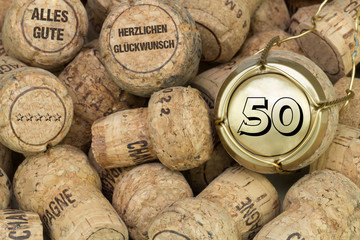 viele Champagnerkorken Jubiläum 50 Jahre