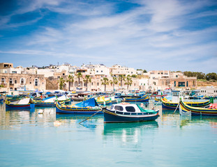 Fototapeta na wymiar boats in Marsaxlokk harbor
