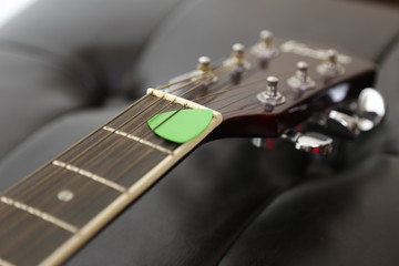 guitar and plectrum