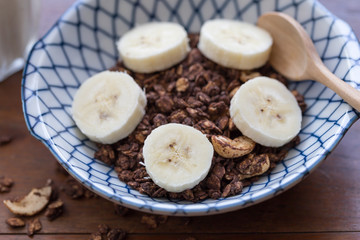 granola with banana in a bowl