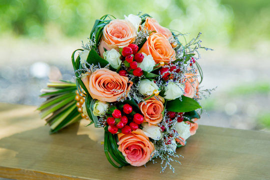 Beautiful orange fall wedding flowers bouquet