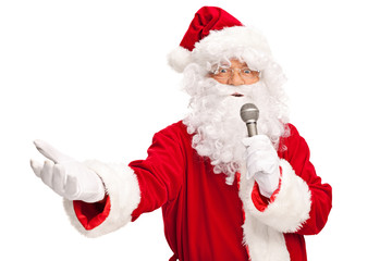 Santa Claus singing on microphone