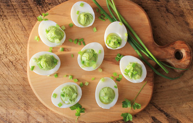 deviled eggs appetizer with avocado