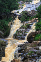 Fototapeta na wymiar Waterfall in the rocky hills of Sri Lanka