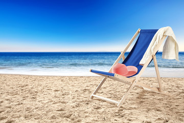 Fototapeta na wymiar chair and beach 